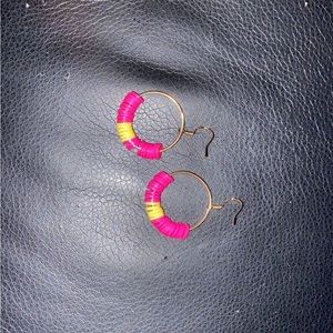 Homemade beaded hoop earrings with clay beads